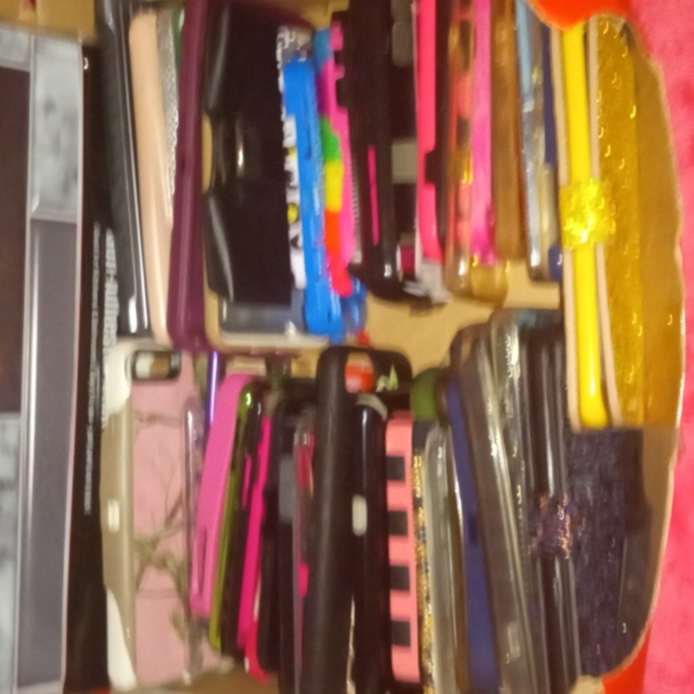 Box of variety of cellphone cases